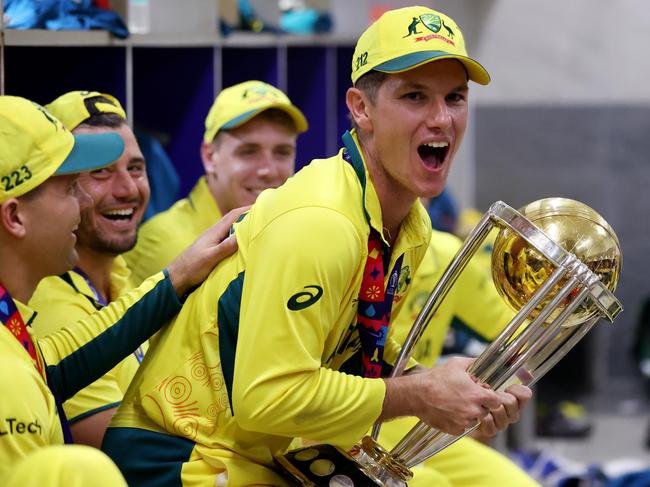 AHMEDABAD, INDIA - NOVEMBER 19: Adam Zampa of Australia poses with the ICC Men's Cricket World Cup Trophy following the ICC Men's Cricket World Cup India 2023 Final between India and Australia at Narendra Modi Stadium on November 19, 2023 in Ahmedabad, India. (Photo by Robert Cianflone/Getty Images)