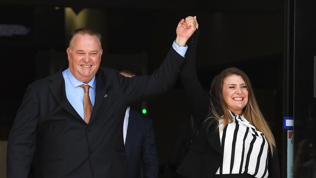 Former Queensland Police officer Rick Flori (left) and social justice advocate Renee Eaves react as they emerge from the Southport Magistrates Court. Picture: AAP Image/Dave Hunt