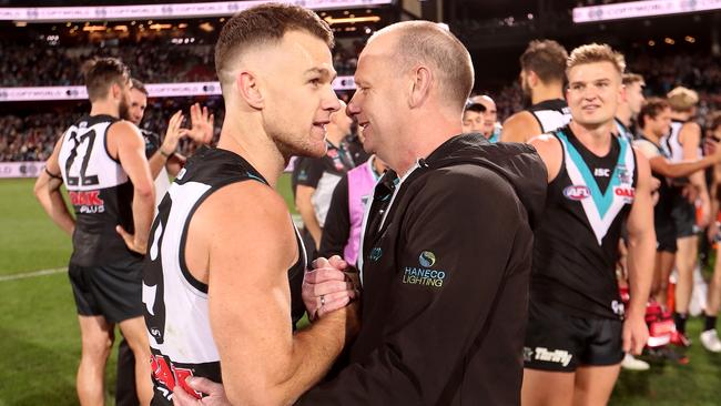 Ken Hinkley with Robbie Gray this season. Picture: James Elsby (Getty).