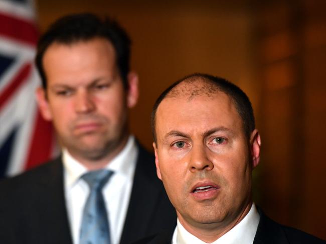 Minister for Resources Matt Canavan and Minister for Energy Josh Frydenberg at a press conference after meeting with state and territory energy ministers at a COAG meeting to discuss the National Energy Guarantee (NEG) at the Shangri La Hotel in Sydney, Friday, August 10, 2018. (AAP Image/Mick Tsikas) NO ARCHIVING