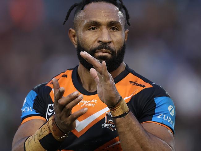 SYDNEY, AUSTRALIA - JUNE 15: Justin Olam of the Wests Tigers celebrate victory following the round 15 NRL match between Wests Tigers and Gold Coast Titans at Leichhardt Oval on June 15, 2024 in Sydney, Australia. (Photo by Jason McCawley/Getty Images)