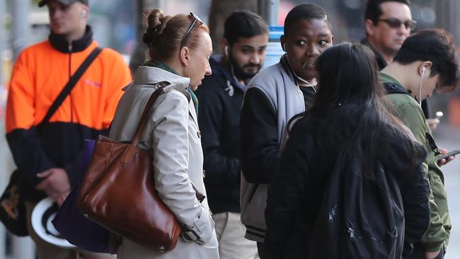 Commuters waiting in Sydney for a bus that may never come. Picture: John Grainger