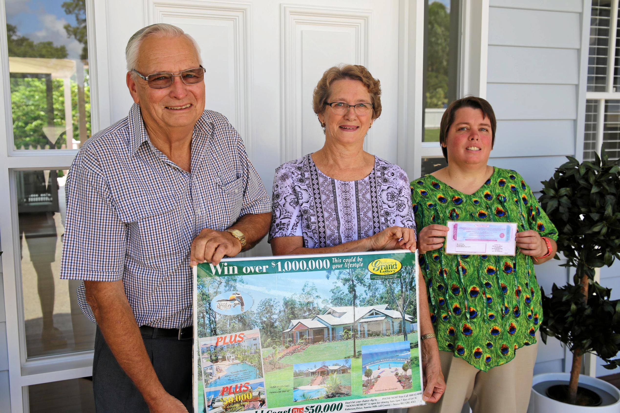 Past winners Allan, Adelyn and their daughter Melissa Webb unveil the Endeavour Foundation's $1.3 million prize home in Montville. Picture: Endeavour Foundation