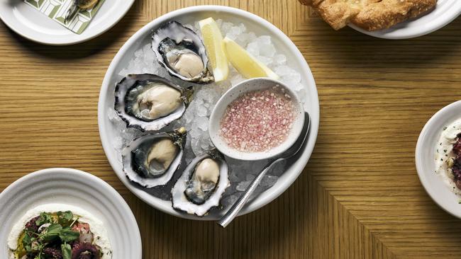 Peppina entrees with Boomer Bay Oysters, with lemon and elderflower mignonette, in the centre. Picture: Remi Chauvin