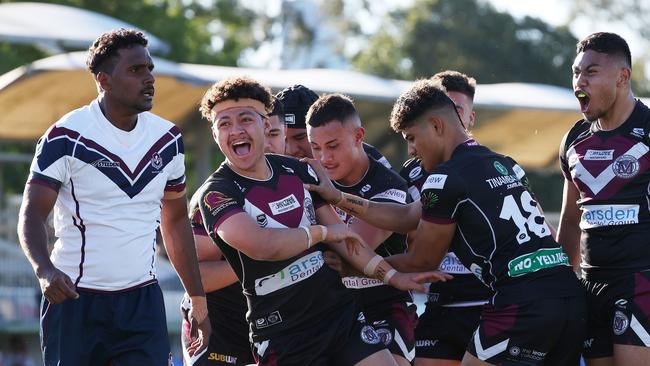 Marsden SHS’s Tyree Bowman celebrates scoring, with Jieye Maua’i over his right shoulder. Picture: Liam Kidston.