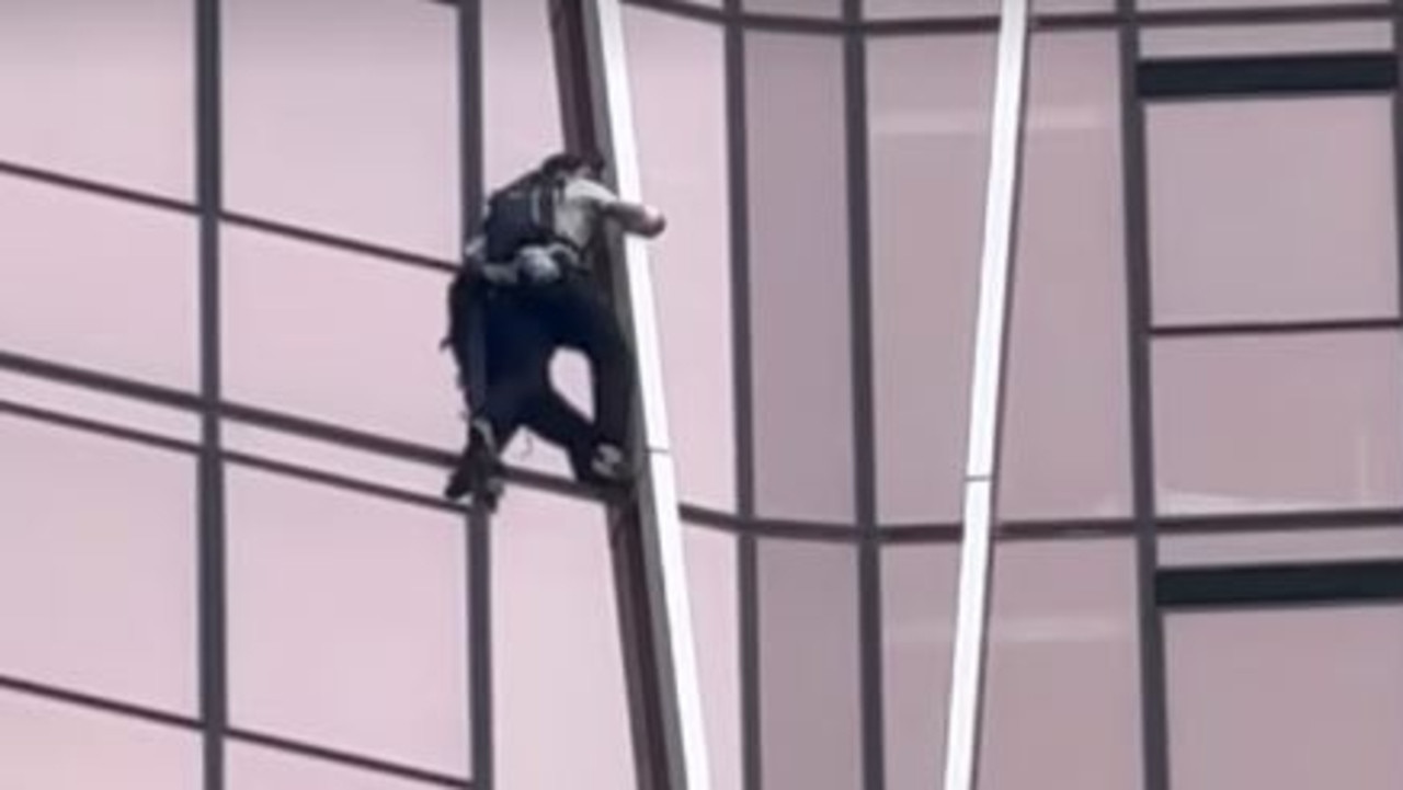 The French free climber who scaled the front of a 50-storey tower in Melbourne’s CBD on Tuesday morning has been charged by police and could face up to five years in jail. Picture: Trent_Theo/Instagram