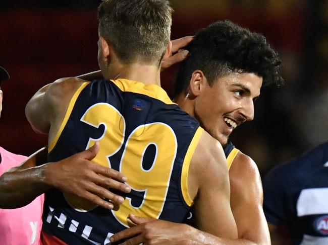 Adelaide's Tom Doedee and Matthew Signorello after the grand final match between the Adelaide Crows and Geelong Cats during the AFLX Adelaide tournament at Coopers Stadium, Hindmarsh, Adelaide, Thursday, February 15, 2018. (AAP Image/Sam Wundke) NO ARCHIVING, EDITORIAL USE ONLY