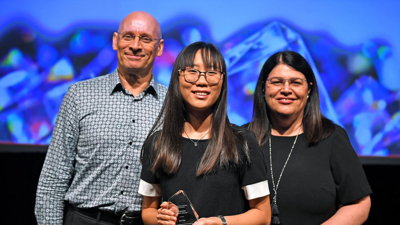 Jisu Choi receiving an award at the QCE Awards presentation. Picture: AAP/John Gass