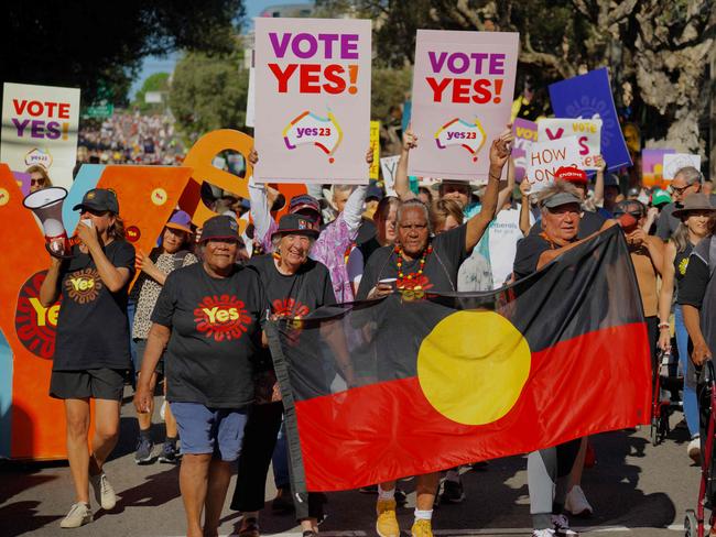 People take part in a "Walk for Yes" rally in Sydney on September 17, 2023. Thousands joined "Walk for Yes" events in major cities, ahead of the referendum that could grant Indigenous Australians a constitutionally enshrined right to be consulted on policies that affect them -- a "Voice to Parliament". (Photo by Andrew LEESON / AFP)