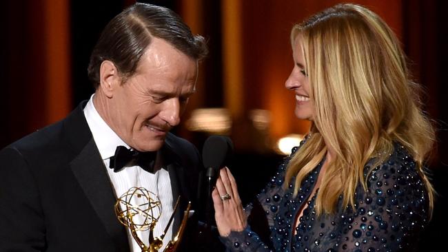 Memorable presentation ... Julia Roberts presents actor Bryan Cranston with Emmy for Outstanding Lead Actor in a Drama Series. Picture: Getty