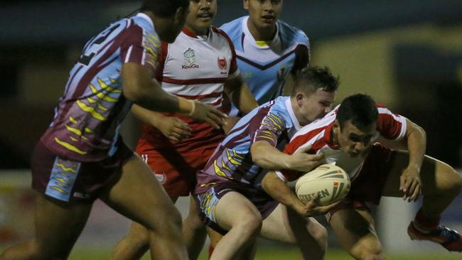 Brent Woolf (right) of Palm Beach Currumbin State School gets tackled by Liam Hampson of Keebra Park State High School during their match at Pizzey Park back in 2015. Picture: Regi Varghese