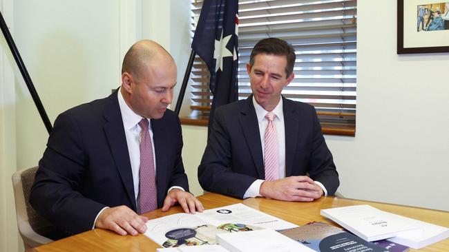 Treasurer Josh Frydenberg and Finance Minister Simon Birmingham with the 2021 budget papers at Parliament House. Picture: Getty Images.