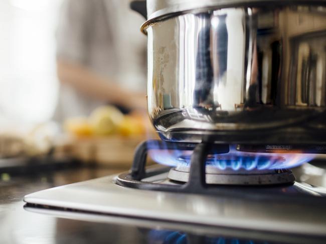 Vegetable steamer on a gas hob.