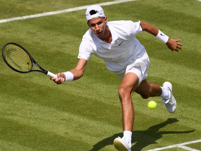 LONDON, ENGLAND - JULY 03: Alexei Popyrin of Australia plays a forehand in his Men's Singles second round match against Daniil Medvedev of Russia during Day three of The Championships - Wimbledon 2019 at All England Lawn Tennis and Croquet Club on July 03, 2019 in London, England. (Photo by Matthias Hangst/Getty Images)