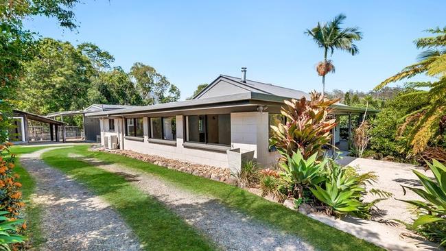 This four bedder at 993 Tallebudgera Creek Road, Tallebudgera Valley, is on a 979sq m block and listed for sale at $1.149m.