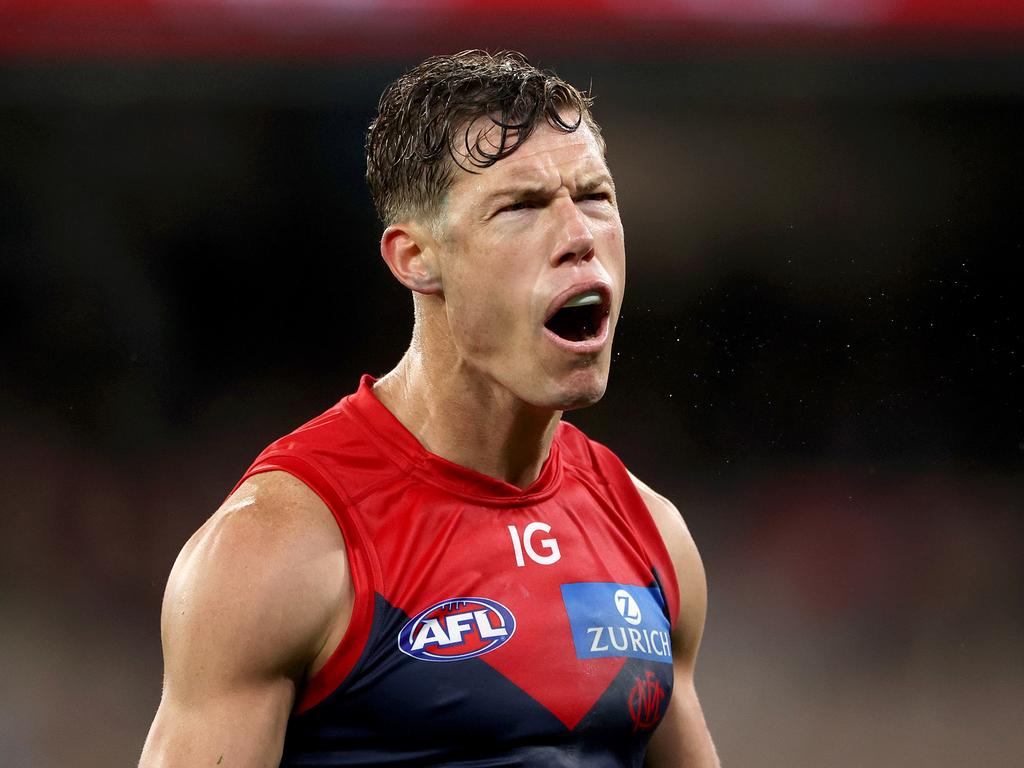 MELBOURNE, AUSTRALIA - JULY 13: Jake Melksham of the Demons celebrates kicking a goal during the round 18 AFL match between Melbourne Demons and Essendon Bombers at Melbourne Cricket Ground, on July 13, 2024, in Melbourne, Australia. (Photo by Kelly Defina/Getty Images)