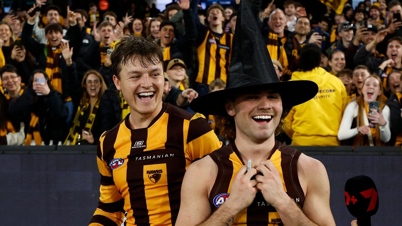 Ginnivan (left) and Nick ‘The Wizard’ Watson celebrate after the Hawks’ 37-point win to book a semi-final against Port Adelaide next week. Picture: Michael Willson / Getty Images