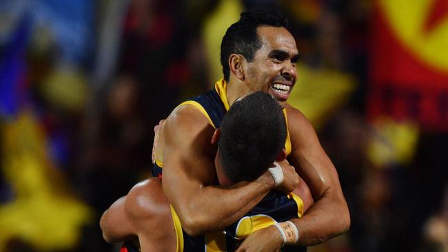 Eddie Betts celebrates his last-term goal with Taylor Walker. Picture: AAP Image/David Mariuz