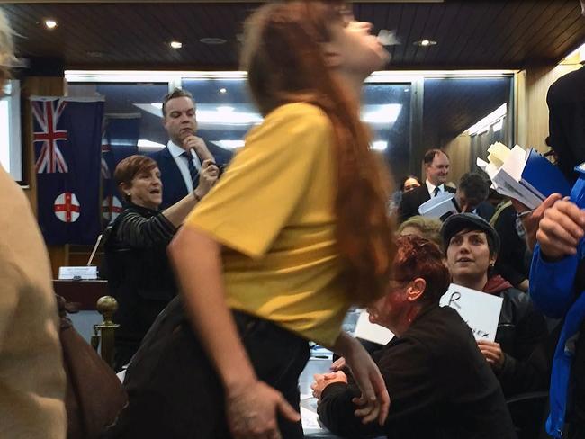 Mr Pearson was infamous spat at by protester Nicky Minus at first amalgamated Inner West Council meeting.