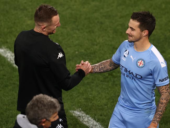 Western United’s Besart Berisha (left) congratulates Golden Boot winner Jamie Maclaren. Picture: Ryan Pierse/Getty Images