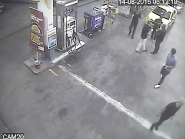 Surveillance video shows swimmers from the United States Olympic team including Ryan Lochte, right, at a petrol station.