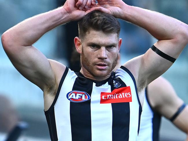 MELBOURNE, AUSTRALIA - MAY 23: Taylor Adams of the Magpies catches his breath during the round 10 AFL match between the Collingwood Magpies and the Port Adelaide Power at Melbourne Cricket Ground on May 23, 2021 in Melbourne, Australia. (Photo by Quinn Rooney/Getty Images)