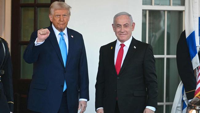 Donald Trump greets Benjamin Netanyahu as he arrives at the North Portico of the White House. Picture: AFP.