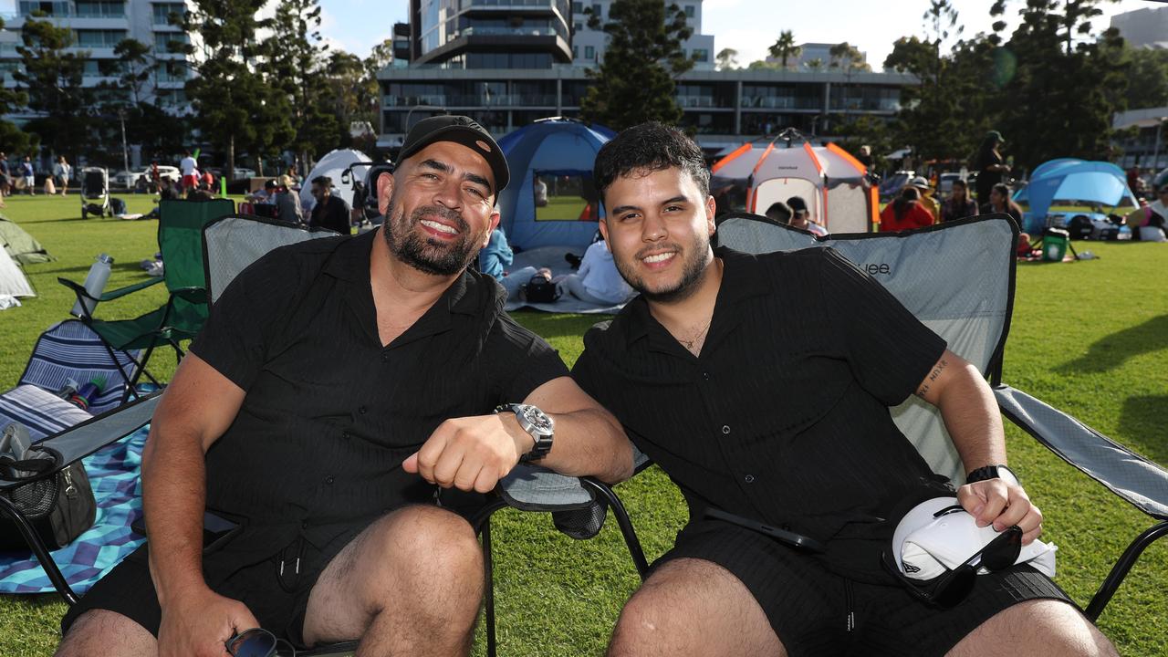 John and Daniel Leal. Locals and visitors arrived early to get a good spot for the Geelong New Years Eve celebrations. Picture: Alan Barber