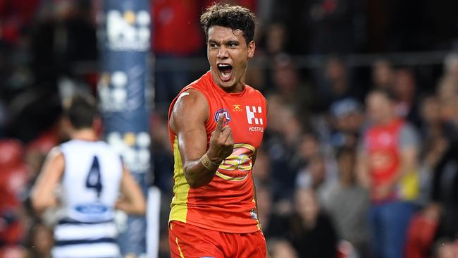 Callum Ah Chee celebrates a goal against Geelong.