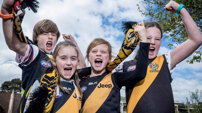 Tigers fans Nick, 11, Tahlia, 9 Emma, 8 and Maya, 9 at Punt Rd Oval. Picture: Jake Nowakowski