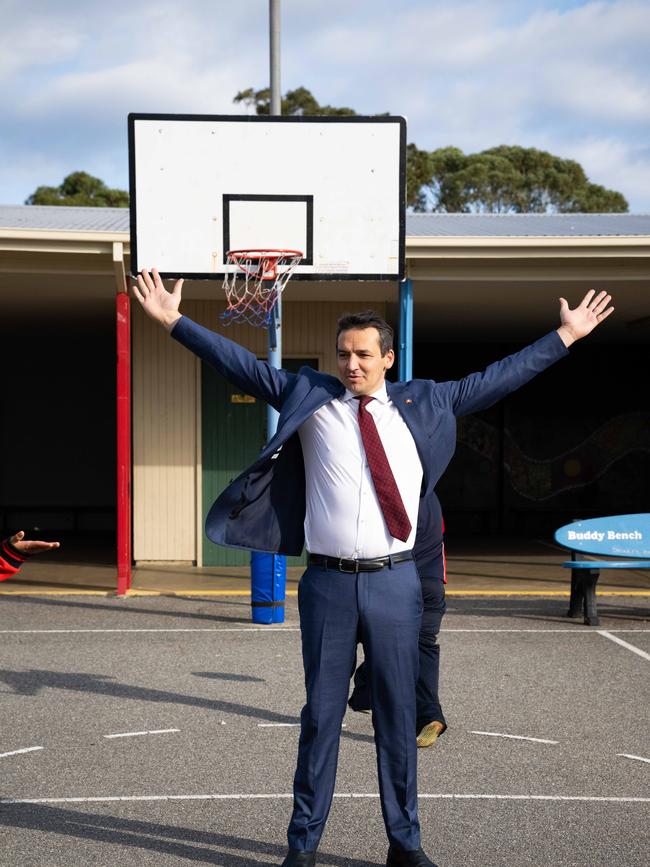 Education Minister Blair Boyer celebrates his winning shot …