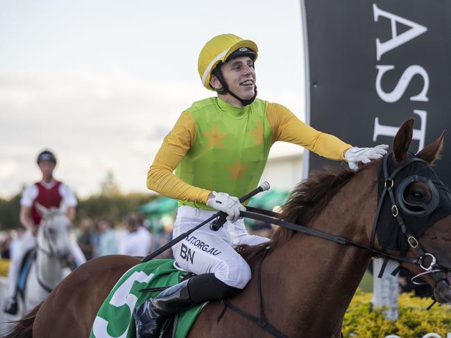 Baylee Nothdurft rides Snitch to victory in race 8, the TAB Goldmarket, during the QTIS Jewel Raceday at Aquis Park on the Gold Coast, Saturday, March 14, 2020. (AAP Image/Glenn Hunt)