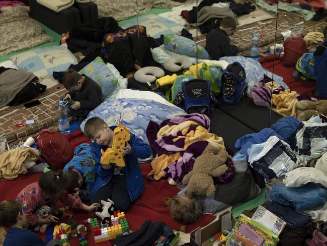 Families are given shelter at the Lviv Puppet theatre in Lviv, Ukraine. Picture: Getty Images