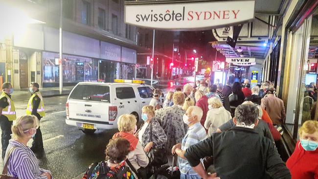 Norwegian Jewel passengers arrive at Swissotel in Sydney CBD on Friday night for 14 days of isolation. Picture: Tom Huntley