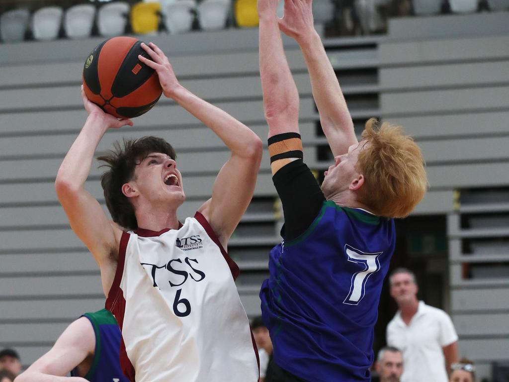 Basketball Australia Schools Championships at Carrara. Mens open final, Lake Ginninderra College Lakers V TSS (in white). the Lakers defence gave Benjamin Tweedy from TSS special attention in the final. Picture Glenn Hampson