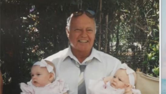 Robert Driver was allegedly knocked from his walker in an “unprovoked attack” at Bolton Clarke’s Lake Macquarie aged care facility on August 20., Robert with his twin granddaughters