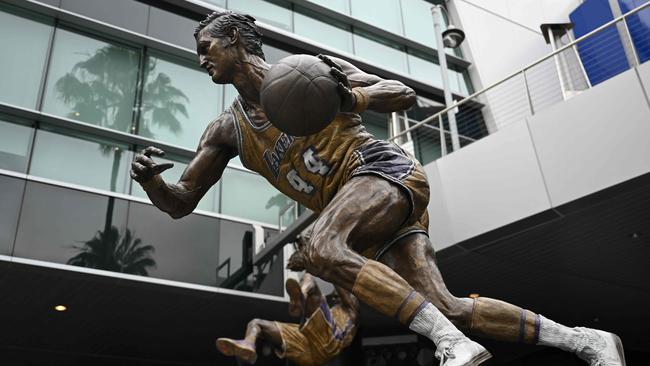 West’s statue outside of the Lakers arena in Los Angeles. (Photo by Patrick T. Fallon / AFP)