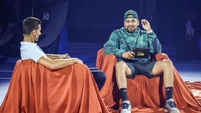 Novak Djokovic (L) is interviewed by Nick Kyrgios ahead of the 2024 Australian Open. (Photo by DAVID GRAY / AFP)