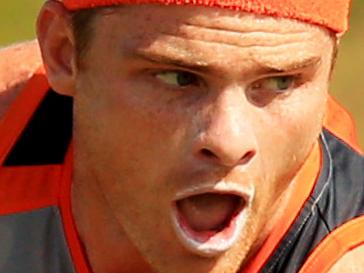 Heath Shaw trains in the heat at Greater Western Sydney Giants training at Sydney Olympic Park. pic Mark Evans