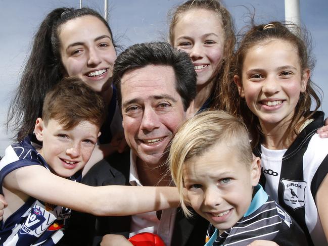 AFL chief Gillon McLachlan get thanks from junior country footballer representatives Tom, Alexandra, Jasmine, Jaska and Coco on changes to country footy governance and support.  Picture: David Caird