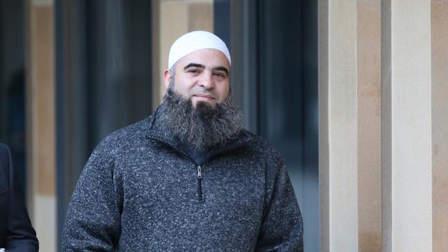 Hamdi Alqudsi leaves Parramatta Court yesterday after he pleaded not guilty to seven counts of ­recruiting men and assisting them with the intention of facilitating their entry into Syria. Picture: Rohan Kelly