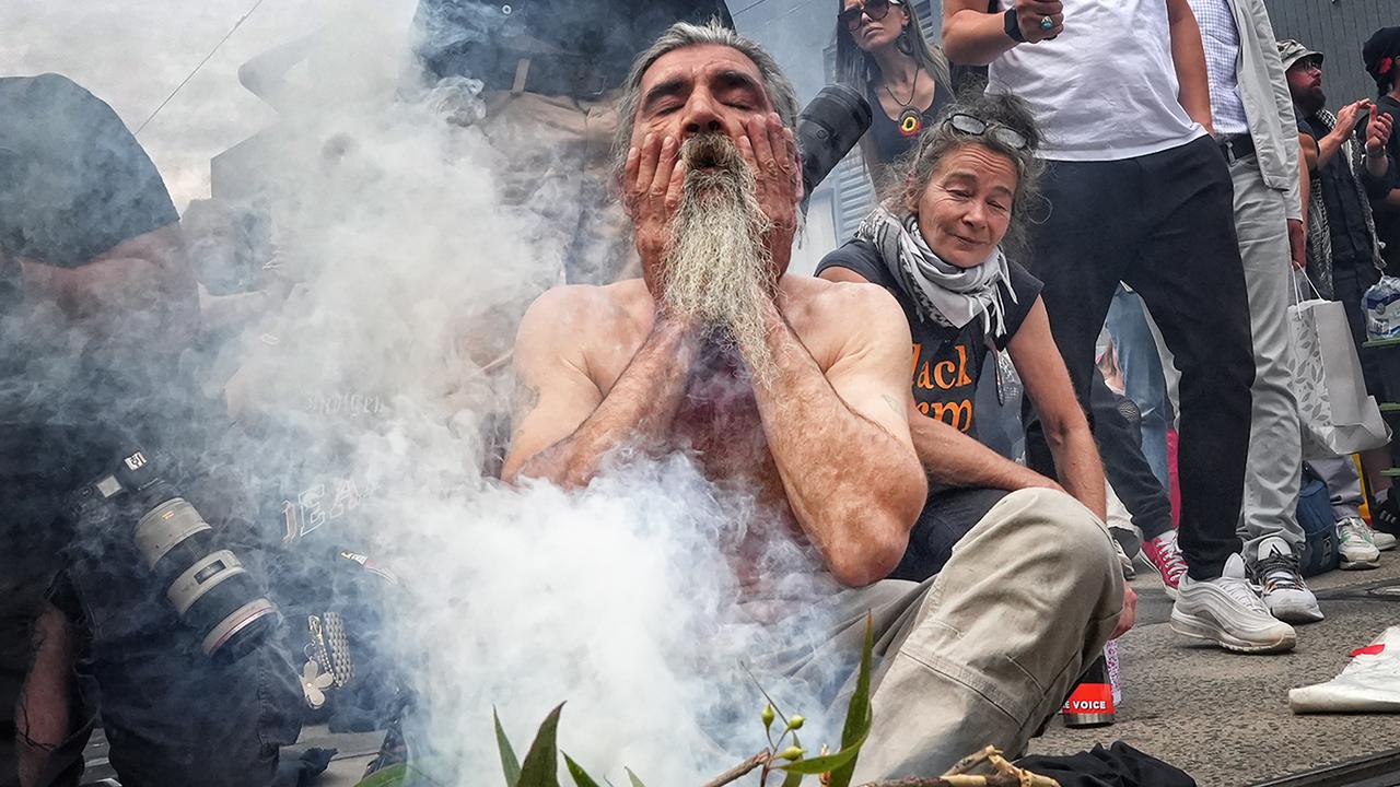 Pro Aboriginal and Palestinian protester march through the streets of Melbourne to mark Invasion Day. Picture: NCA NewsWire/Luis Enrique Ascui