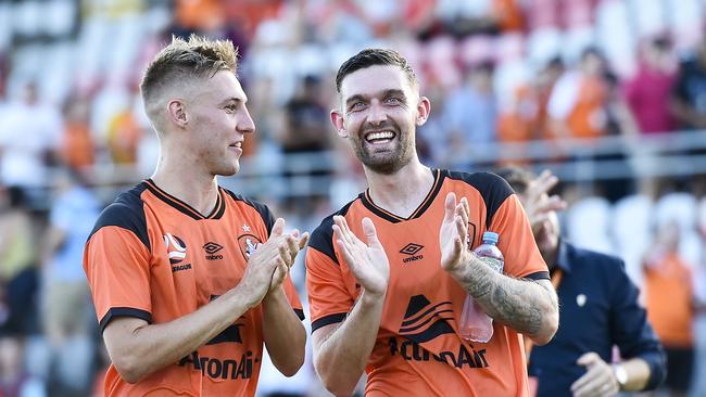 Jesse Daley (left) and Jay O'Shea celebrate Brisbane Roar’s thrashing of Melbourne Victory. Picture: Albert Perez/Getty Images