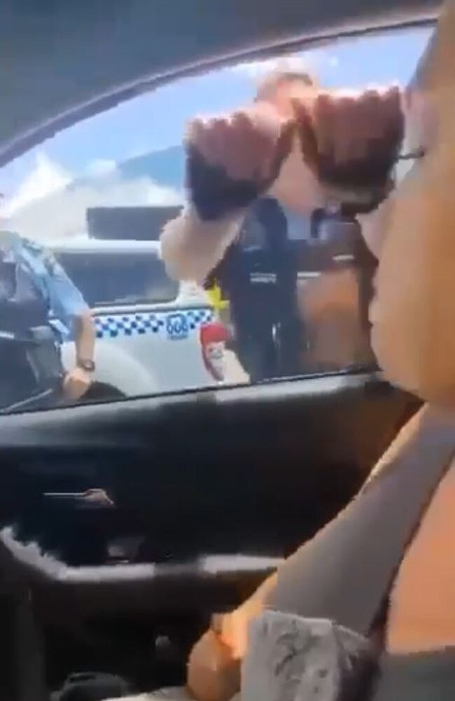 Coffs Harbour police were forced to break the window to arrest Helen Mary Delaney, 52, who was allegedly wanted on two outstanding arrest warrants for domestic violence-related offences.