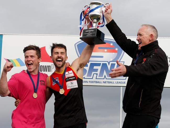 Shane Morwood and captain Travis La Rocca after Dingley’s 2019 premiership.