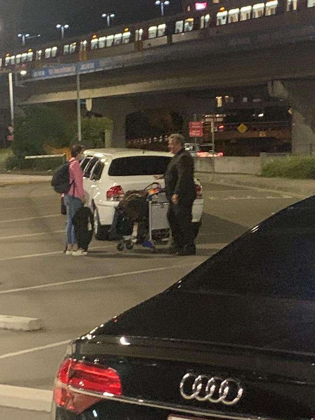 Jayne Hrdlicka arrives at Brisbane Airport to a waiting limo on Sunday.