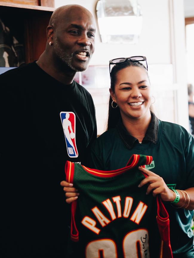 NBA legend Gary Payton with a fan at his Block Party. Picture: Supplied