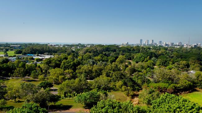 How great is the outdoors in the NT? Elevated view of the Darwin skyline, high-rise buildings and the botanical gardens from Darwin High School.