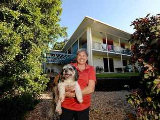 GOOD LOCALITY: Homeowner Margaret Scott with her dog Benji. Picture: Stuart Quinn