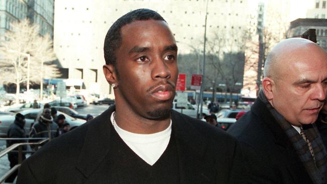 Diddy outside court during a 2000 brush with the law.